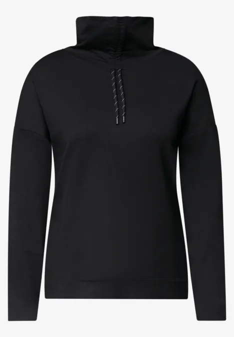 Schlichter schwarzer Pullover für Damen mit hohem Kragen und Reißverschluss.