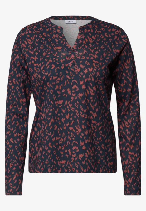 Shirt mit Split Neck im Tunika-Look urban dark blue Dunkelblaue, lange Damenbluse mit V-Ausschnitt und abstraktem orange-rotem Punktmuster.