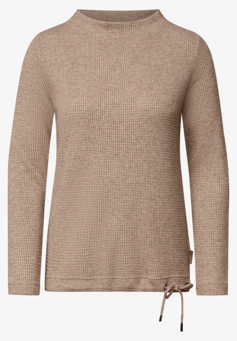 Shirt mit Funnel Neck und Waffelstruktur creamy mocha melange Hellbeiger Pullover mit Rundhals, Langarm und seitlicher Zierschleife.