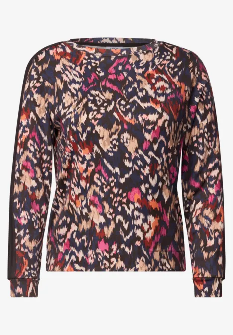 Lang shirt met abstracte meerkleurige print op een zwarte basis