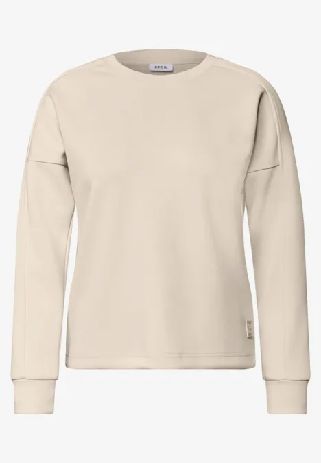 T-shirt à manches longues, col rond et texture côtelée pearl beige Beiges Sweatshirt mit langen Ärmeln und Rundhalsausschnitt.