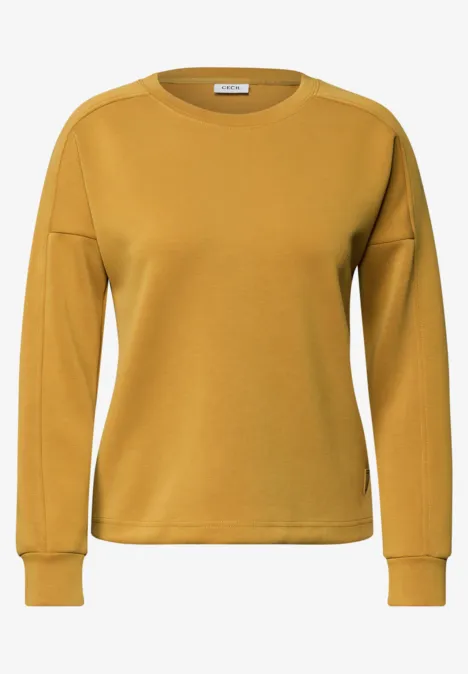 T-shirt à manches longues, col rond et texture côtelée golden honey Gelbes Sweatshirt mit Rundhalsausschnitt und langen Ärmeln.