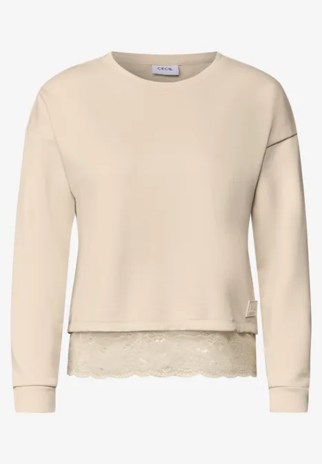 Beżowy sweter damski z koronkową lamówką