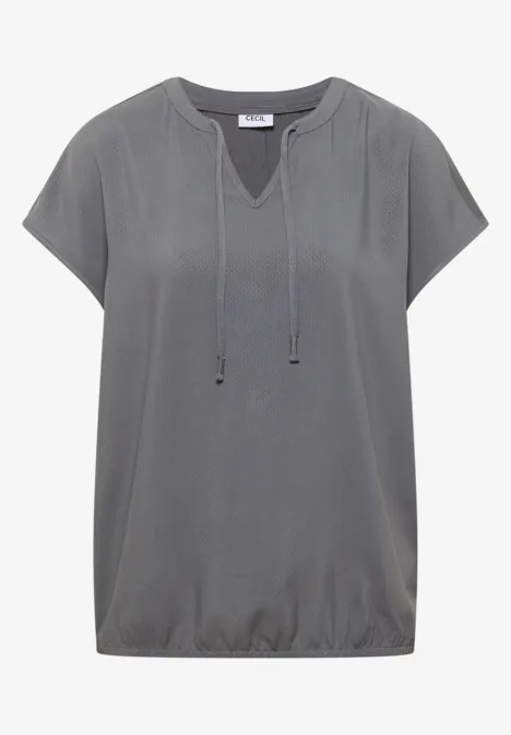 Grijs shirt met korte mouwen, V-hals met koordjes en elastische zoom, losse pasvorm.