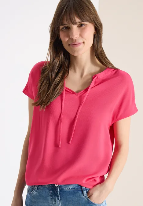 Blouse à manches courtes avec mélange de structures geranium red