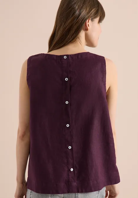 Ärmelloses, locker geschnittenes Top aus Leinen in dunklem Lila mit durchgehender Knopfleiste am Rücken.