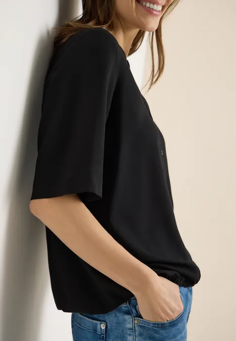 Blouse met gespleten hals en elastische zoom Black Blouse met gespleten hals en elastische zoom Black