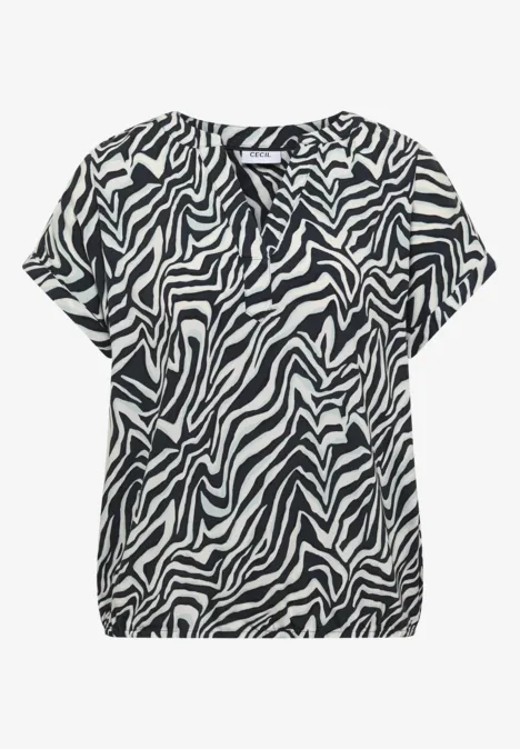 Kurze Damenbluse mit schwarz-weißem Zebra-Muster, locker geschnitten und mit Rundhalsausschnitt.