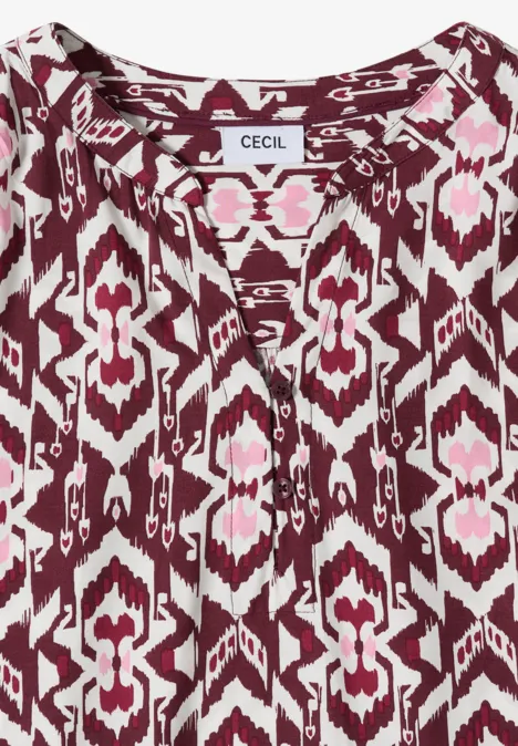 Damesblouse met roze-wit-bruin ikat-patroon, V-hals en losse pasvorm van CECIL.