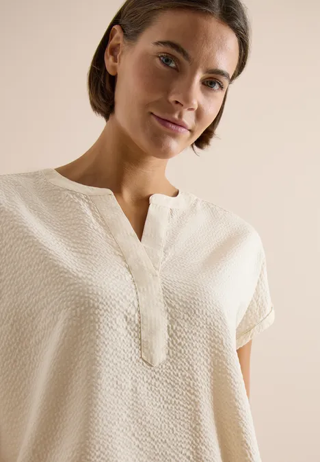 Blouse à épaules tombantes en seersucker pearl beige Blouse à épaules tombantes en seersucker pearl beige