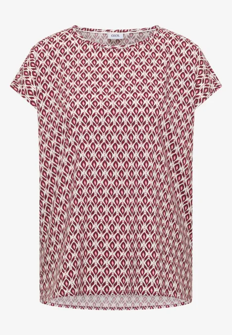 T-shirt rouge à manches courtes avec motif géométrique blanc.