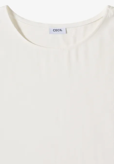 Haut blanc femme sans manches à encolure ronde.