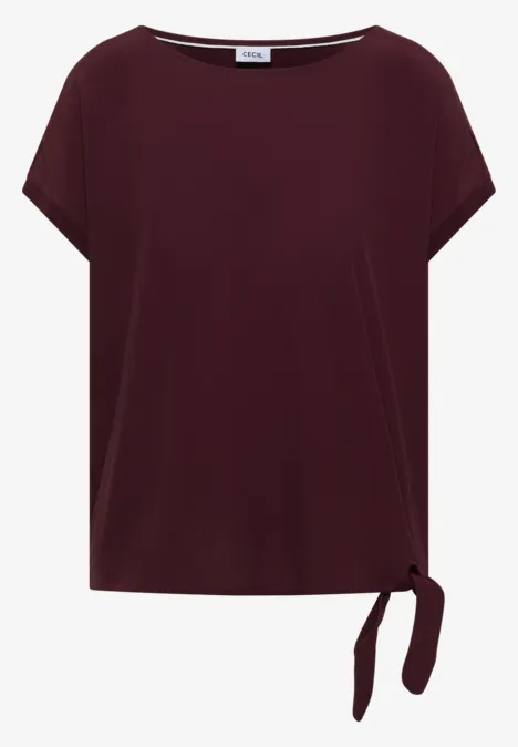 T-shirt femme bordeaux à manches courtes, col rond et nœud sur le côté de l'ourlet.