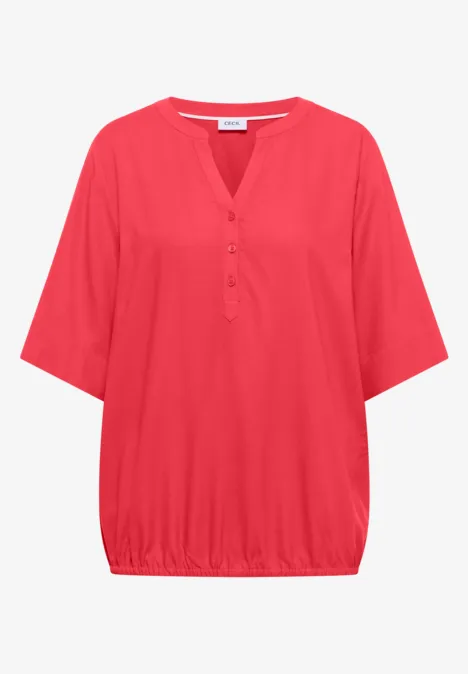 Blouse met korte mouwen en gespleten hals coral Blouse met korte mouwen en gespleten hals coral