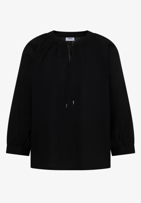 Schwarze Damenbluse mit langen Ärmeln, gerafftem Rundhalsausschnitt und Bindebändern.