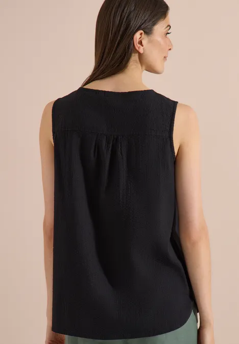 Blusentop mit Split Neck und Bändern Black Rückenansicht eines schwarzen, ärmellosen Damen-Tops mit Rundhalsausschnitt und leichter Raffung unter der Passe.