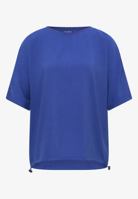 Dropped Shoulder Blusenshirt in Unifarbe deep river blue Blaue, kurzärmelige Bluse mit rundem Ausschnitt und Tunnelzug am Saum.