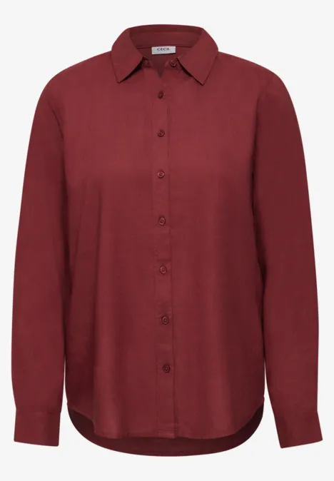 Damenbluse in burgundrot mit Kragen und durchgehender Knopfleiste.