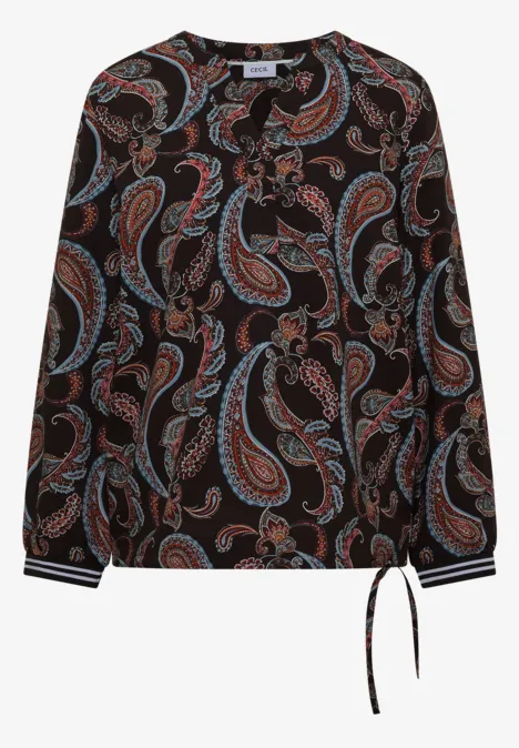 Schwarze Bluse mit buntem Paisley-Muster, langen Ärmeln, gestreiften Manschetten und Tunnelzug am Saum.