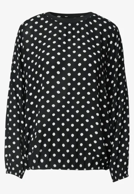 Schwarzer Pullover mit weißen Polka-Dots