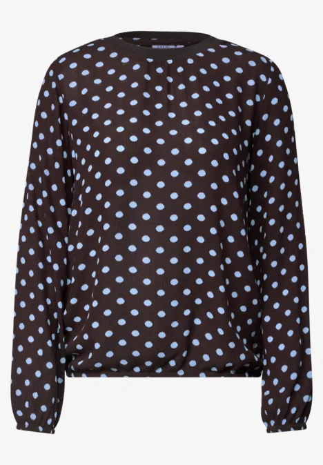 Braune Bluse mit langen Ärmeln und hellblauen Polka Dots