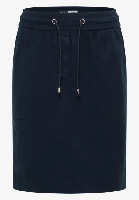 Donkerblauwe knielange jerseyrok met elastische taille, aantrekkoord en steekzakken.