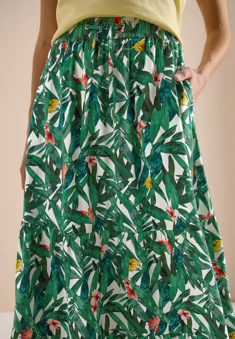 Lange rok met groen bladprint en elastische taille voor een losse pasvorm.