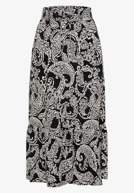 Jupe longue à motifs floraux Black Jupe longue noire en tissu fluide, motif paisley et floral blanc, taille élastiquée.