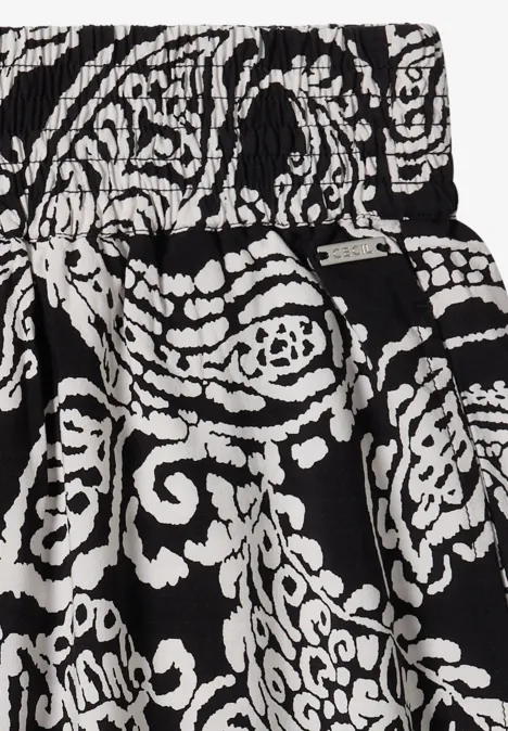 Jupe longue à motifs floraux Black Jupe noire à motif cachemire blanc avec taille smockée élastique.