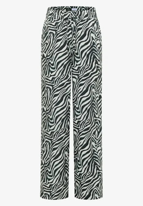 Pantalon ample à motif zébré noir et blanc avec ceinture à cordon.