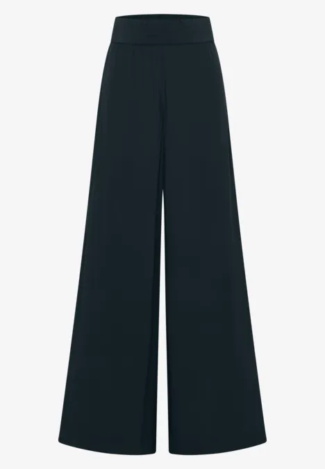 High Waist Wide Leg Hose im Loose Fit palm breeze green Schwarze weite Hose mit hohem Bund und ausgestellten Beinen.