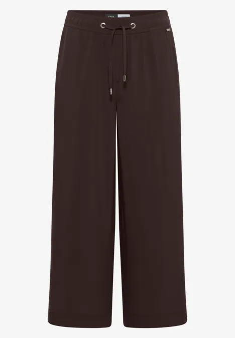 Schlichte, gerade geschnittene, dunkelbraune Hose mit weitem Bein und Tunnelzugbund.