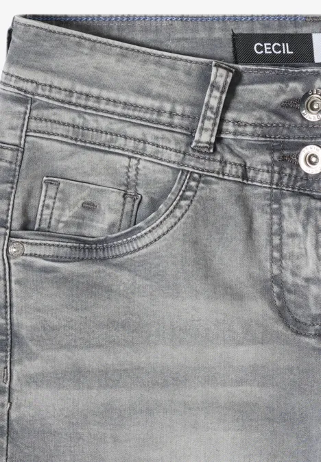 Gros plan sur un jean en denim gris CECIL avec poches et boutons.