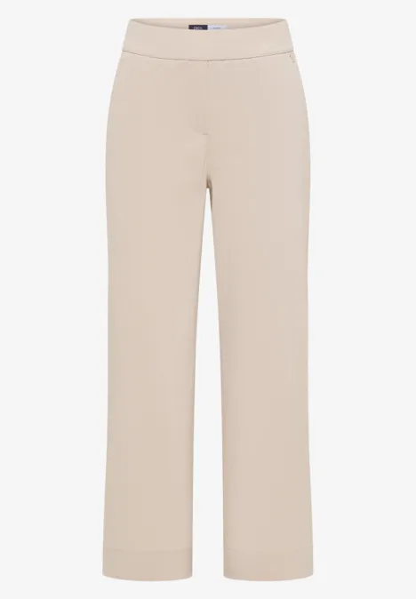 Beige, weit geschnittene Hose mit hohem Bund aus leichtem Stoff.