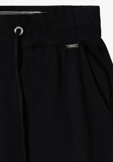 Zwarte joggingbroek van katoenmix met elastische taille, trekkoord en zijzakken.