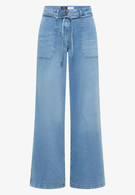 Jean large clair à taille haute, taille coulissée et grandes poches plaquées avant.