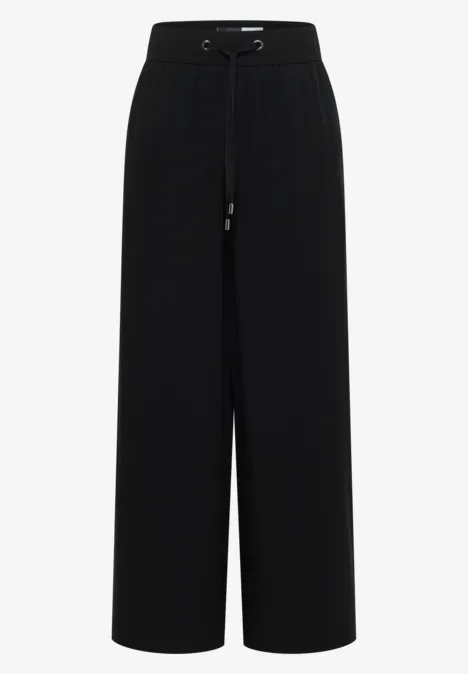 Schwarze, weite Hose mit hohem Bund und Kordelzug