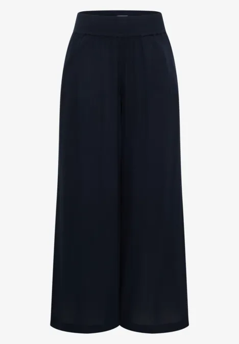 Pantalon large noir en tissu fluide