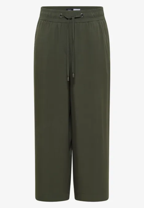 Locker sitzende, weite, knöchellange Hose in Olivgrün mit elastischem Bund und Kordelzug.