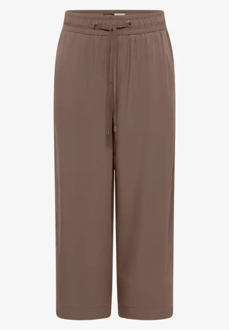 Braune, weite, knöchellange Hose mit elastischem Bund und Bindeband.