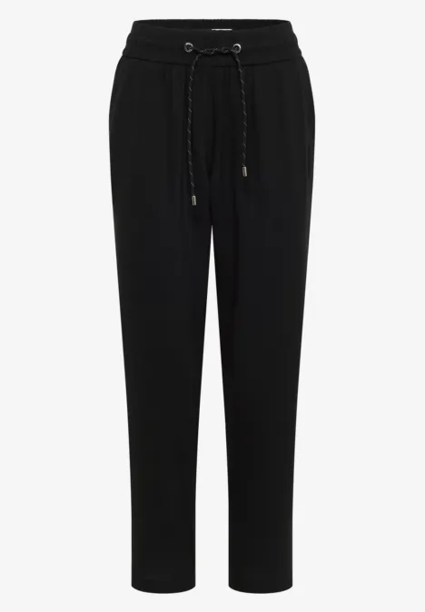 Zwarte joggingbroek met elastische taille en aantrekkoord.