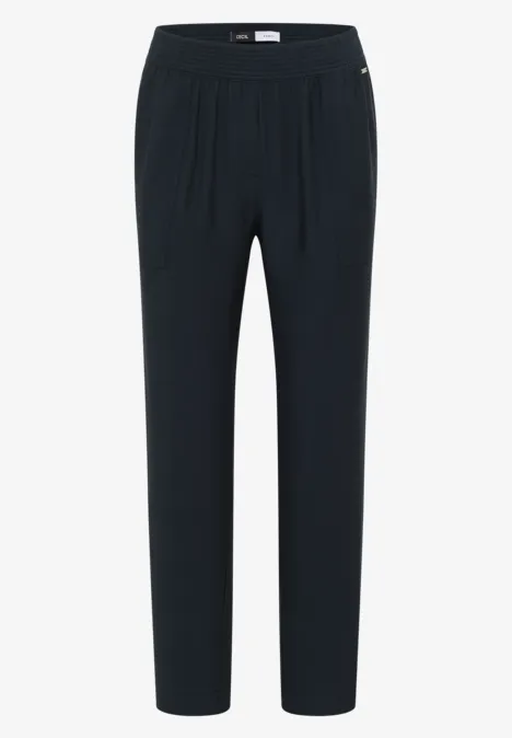 Schwarze Hose mit elastischem Bund, geradem Schnitt und lässiger Passform.