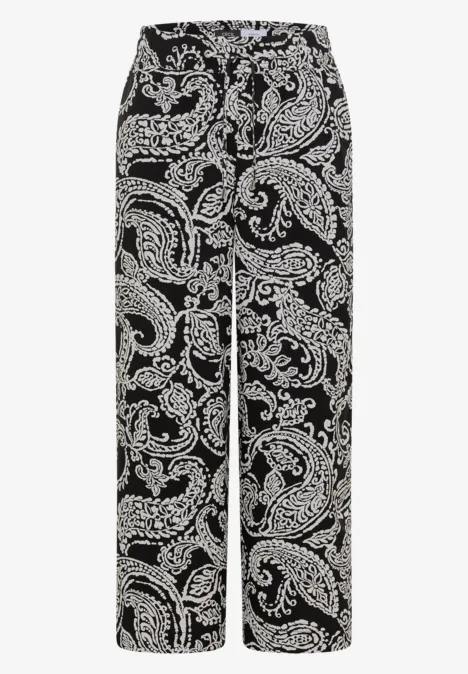 Schwarze, weit geschnittene Hose mit weißem Paisley-Blumenmuster