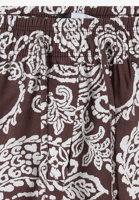 7/8 High Waist Wide Leg Hose im Loose Fit brown cacao Brauner Stoff mit weißem, verspieltem Blumenmuster und elastischem Bund