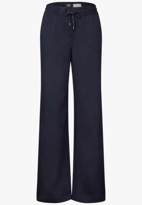 Broek met High Waist en Wide Leg pijpen in een Loose Fit pasvorm urban dark blue Donkerblauwe, wijdvallende sweatbroek met elastische taille en trekkoord.