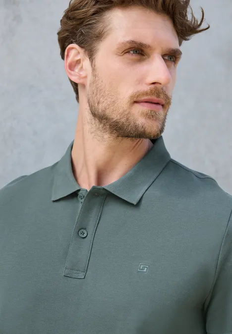 Polo piqué teal green