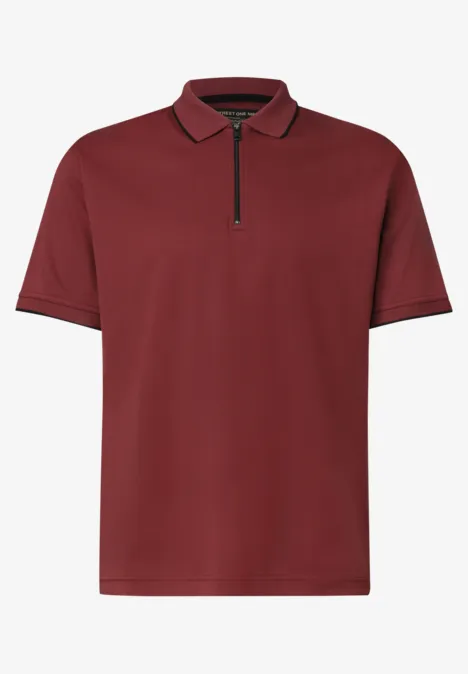 Polo met korte mouwen en ritssluiting burnt crimson red Bordeauxrotes Poloshirt mit kurzem Reißverschluss und kurzen Ärmeln.