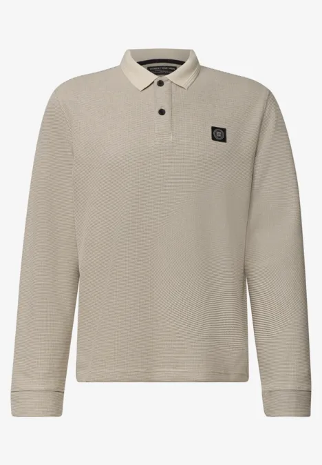 Langarm Poloshirt in Waffelstruktur antique beige Beige langärmeliges Poloshirt mit Knopfkragen und kleinem schwarzen Markenlogo.
