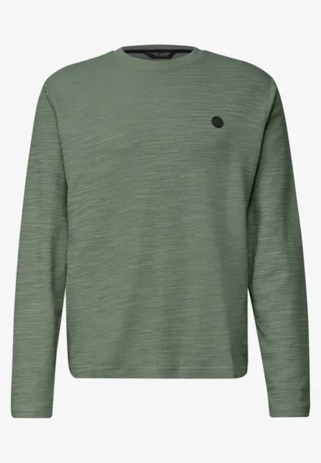 Langarm Shirt mit Rundhals in Unifarbe willow green Grüner Pullover mit Langarm und Rundhalsausschnitt, dezenter Textur und kleinem Logo auf der Brust.