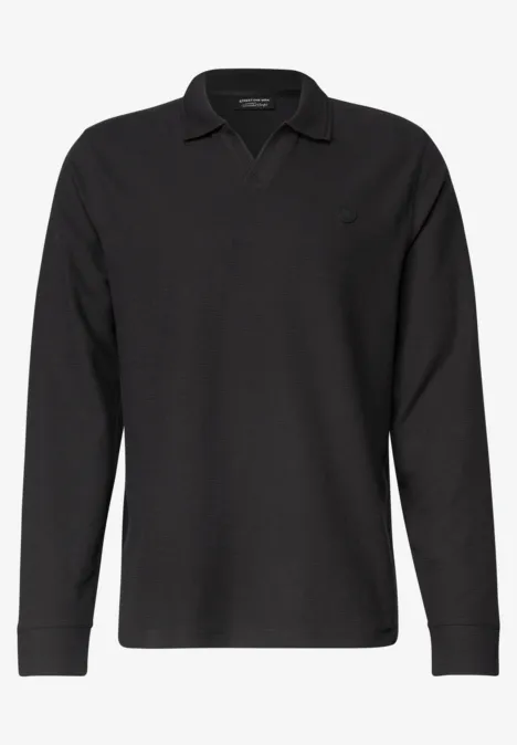 Polo noir à manches longues, col classique et logo discret, en maille confortable.
